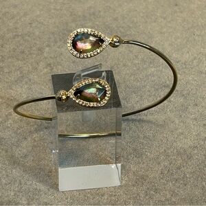 cuff bangle two teardrop iridescent gemstones surrounded by pavé setting accents